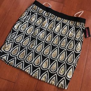 Black and gold sequin mini skirt